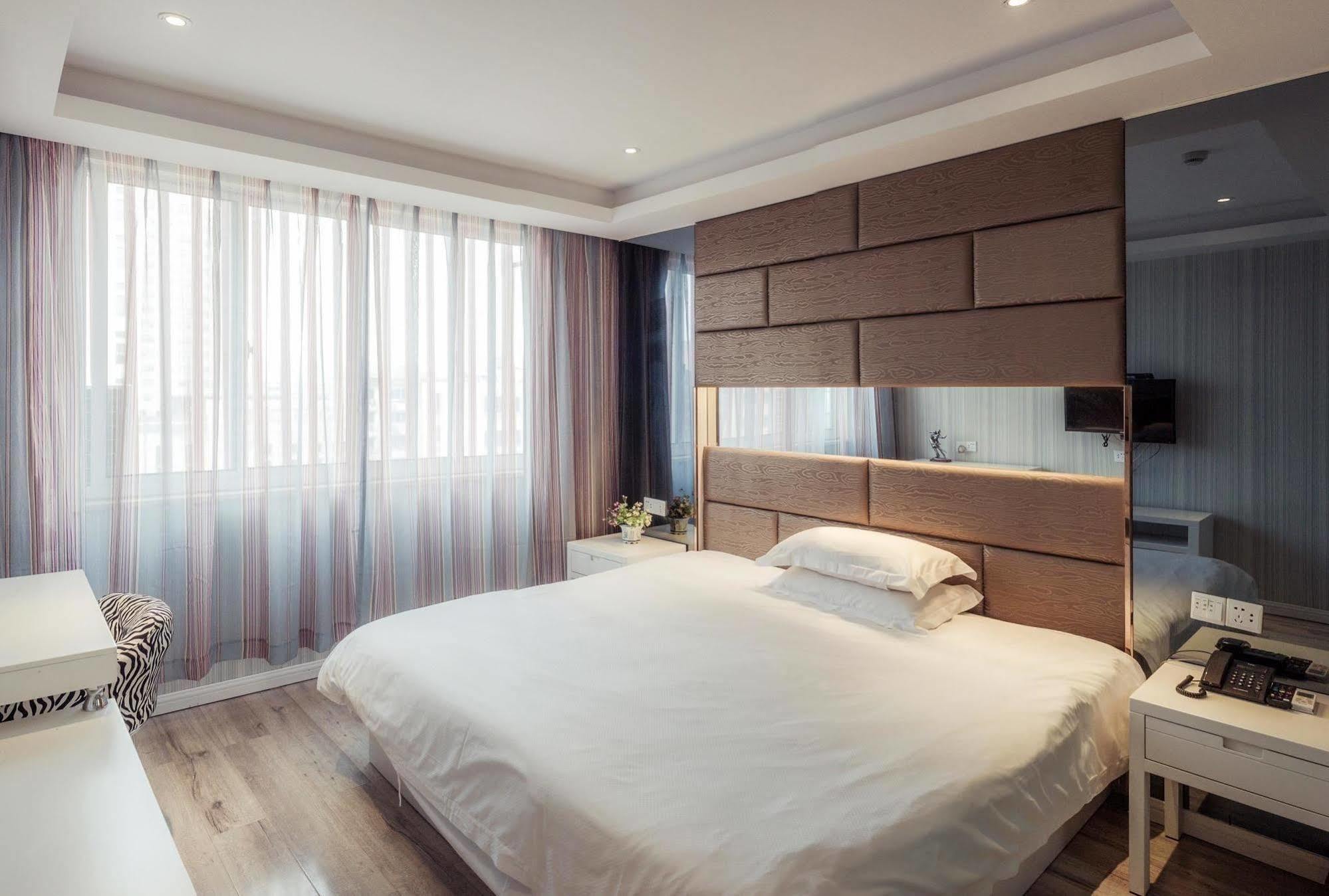 Milan Fashion Hotel Deqing Exterior photo