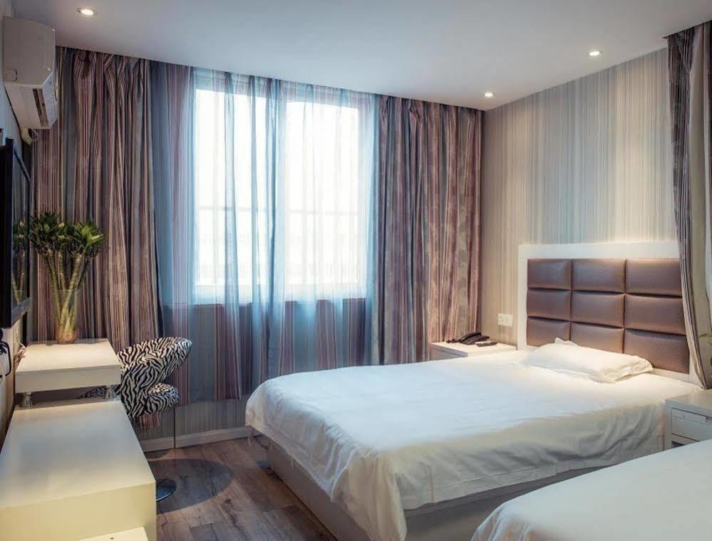 Milan Fashion Hotel Deqing Exterior photo