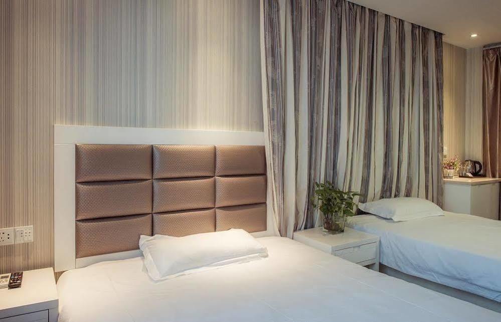 Milan Fashion Hotel Deqing Exterior photo